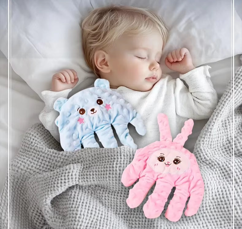 Baby Sleep Aid Hand that mimics gentle patting to help babies relax and fall asleep, with remote control, suitable for infants and toddlers.