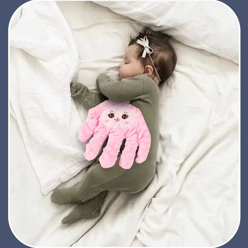Baby Sleep Aid Hand that mimics gentle patting to help babies relax and fall asleep, with remote control, suitable for infants and toddlers.